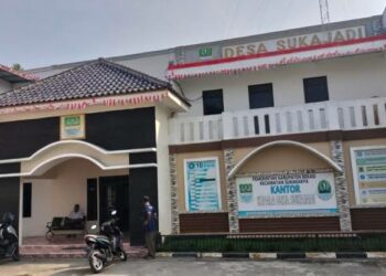 “Kepala Desa Sukajadi Kecamatan Sukakarya Kabupaten Bekasi diduga korupsi, hal ini disebabkan adanya indikasi terjadinya dugaan penyalahgunaan wewenang dan penyelewengan anggaran.”