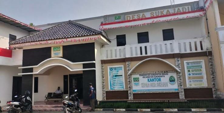 “Kepala Desa Sukajadi Kecamatan Sukakarya Kabupaten Bekasi diduga korupsi, hal ini disebabkan adanya indikasi terjadinya dugaan penyalahgunaan wewenang dan penyelewengan anggaran.”